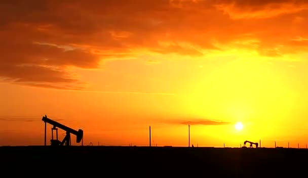 Sun Setting on an Oil Field